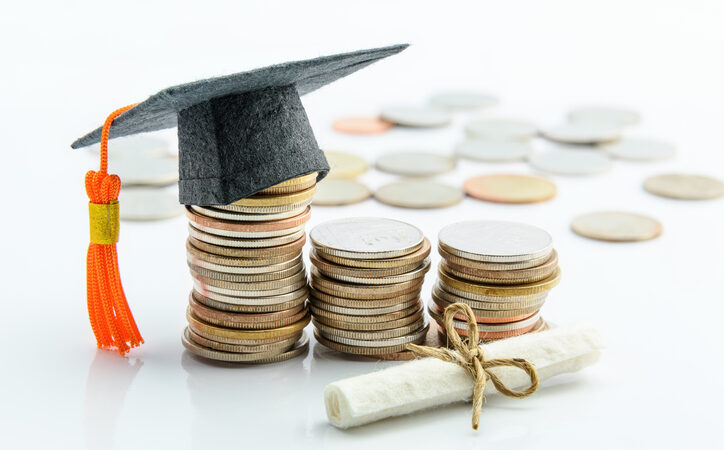 Money Cost Saving Or Money Reserve For Goal And Success In School, Higher Level Education Concept : US Dollar Coins / Cash, A Black Graduation Cap Or Hat, A Certificate / Diploma On White Background.